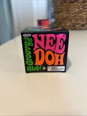 The Nee Doh Groovy Glob! Kids Stress Ball Toy - Pink & Orange